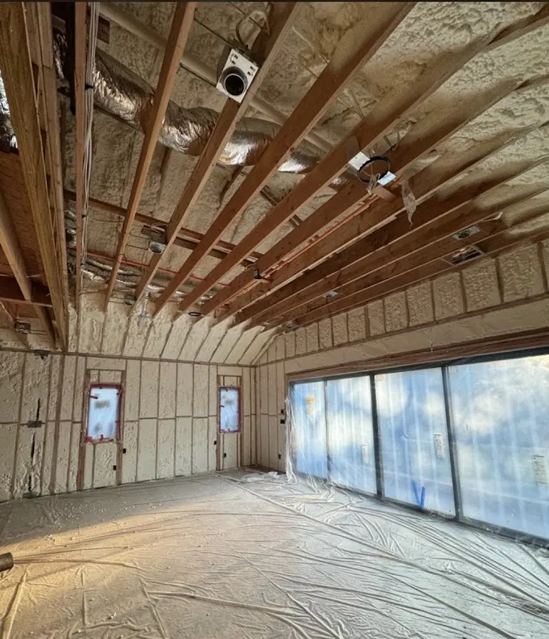 Interior walls and ceiling insulated with spray foam during new construction in Cupertino
